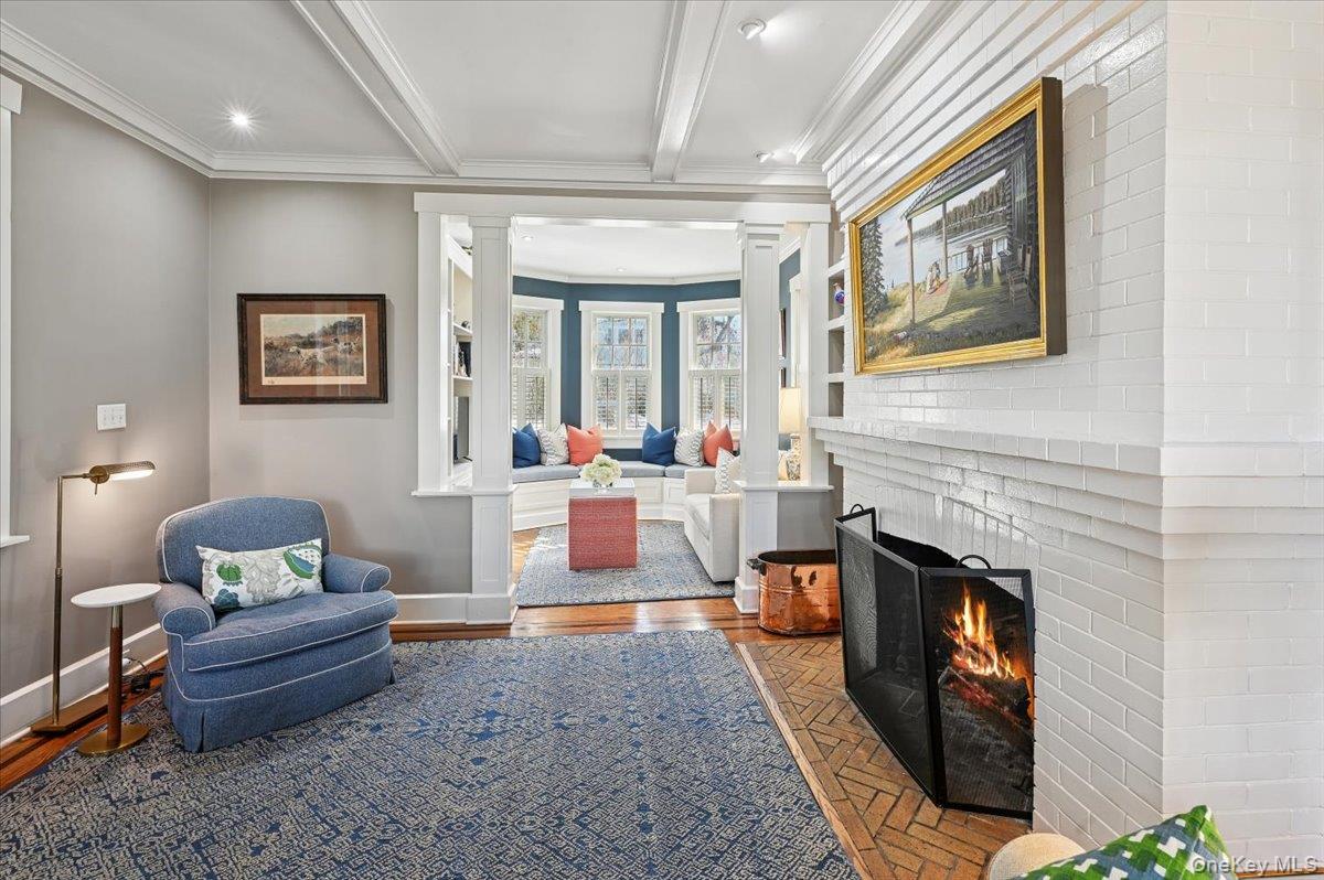31 Emerson Road Larchmont, NY 10538 - Photo 4 of 39 A view looking toward the sunroom which has built-in bench seating with storage below.