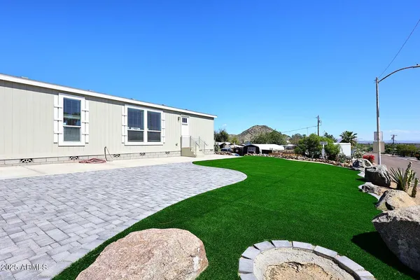 a house view with a garden space