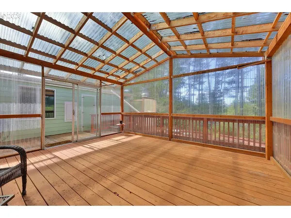 a view of a yard from a balcony