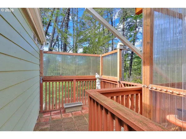 a view of a street with a building in the background