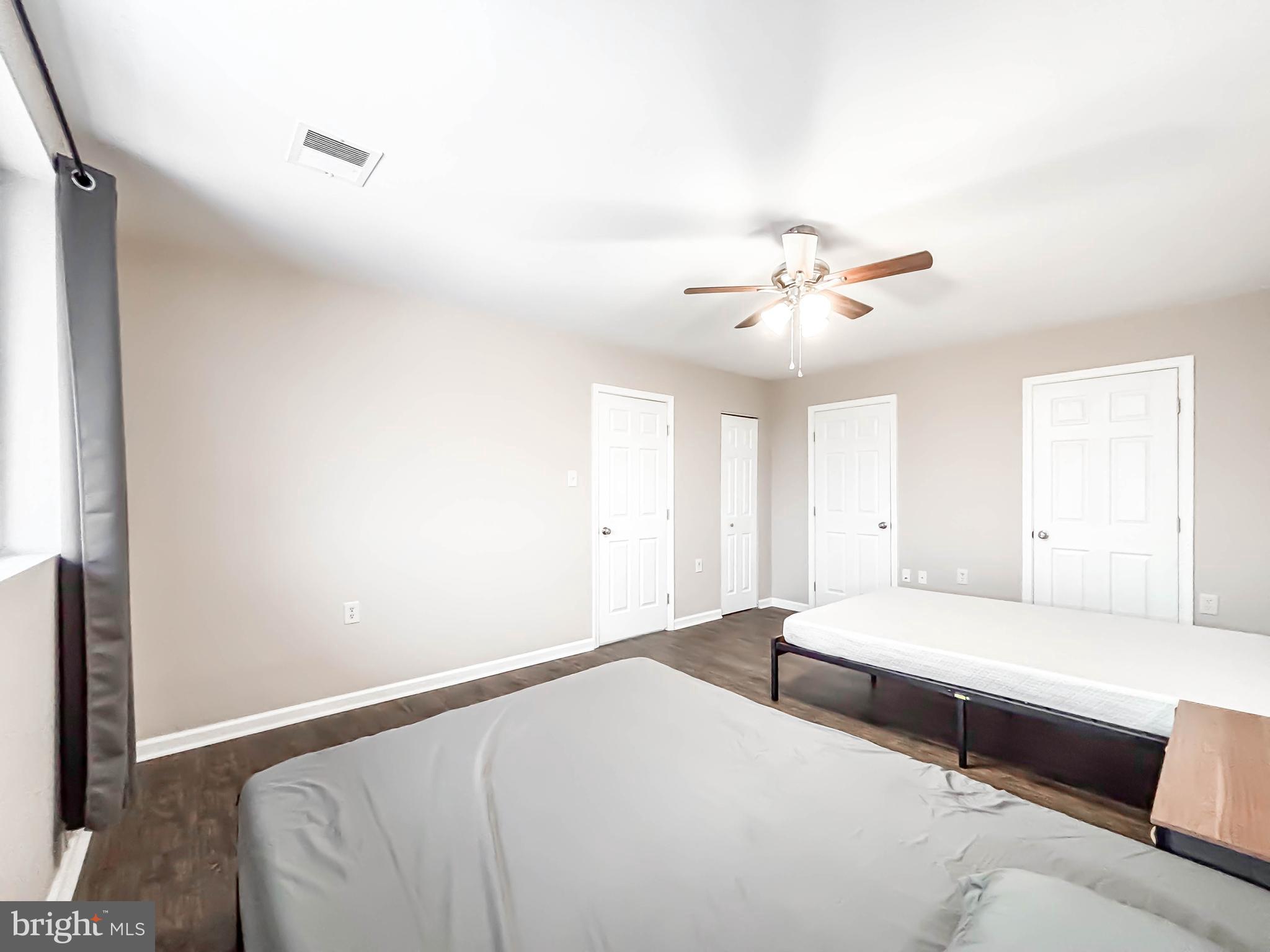 3924 Rolling Rd., Unit B11 Pikesville, MD 21208 - Photo 23 of 31 a bedroom with a bed and window