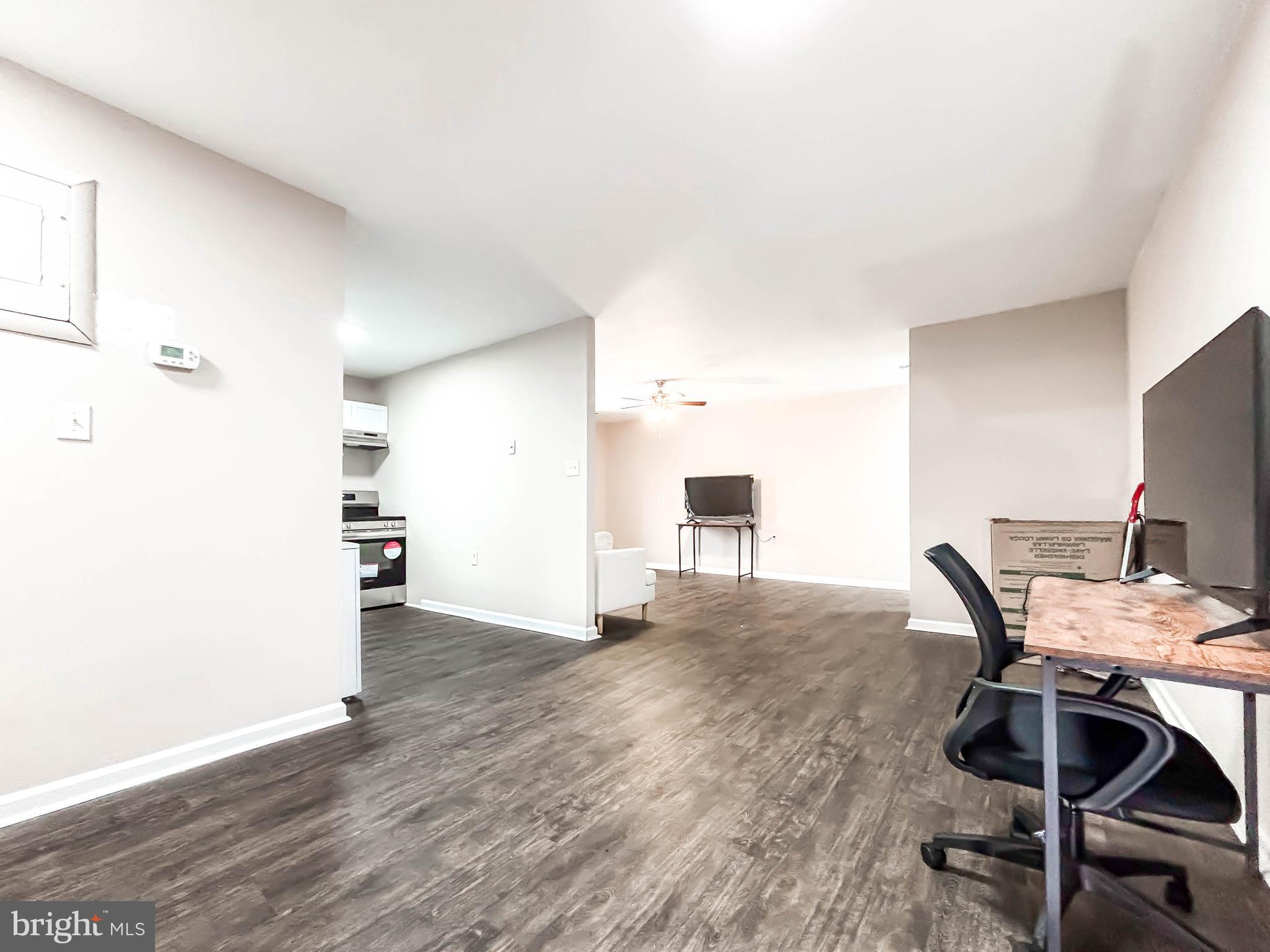 3924 Rolling Rd., Unit B11 Pikesville, MD 21208 - Photo 10 of 31 a workspace with furniture and bathroom