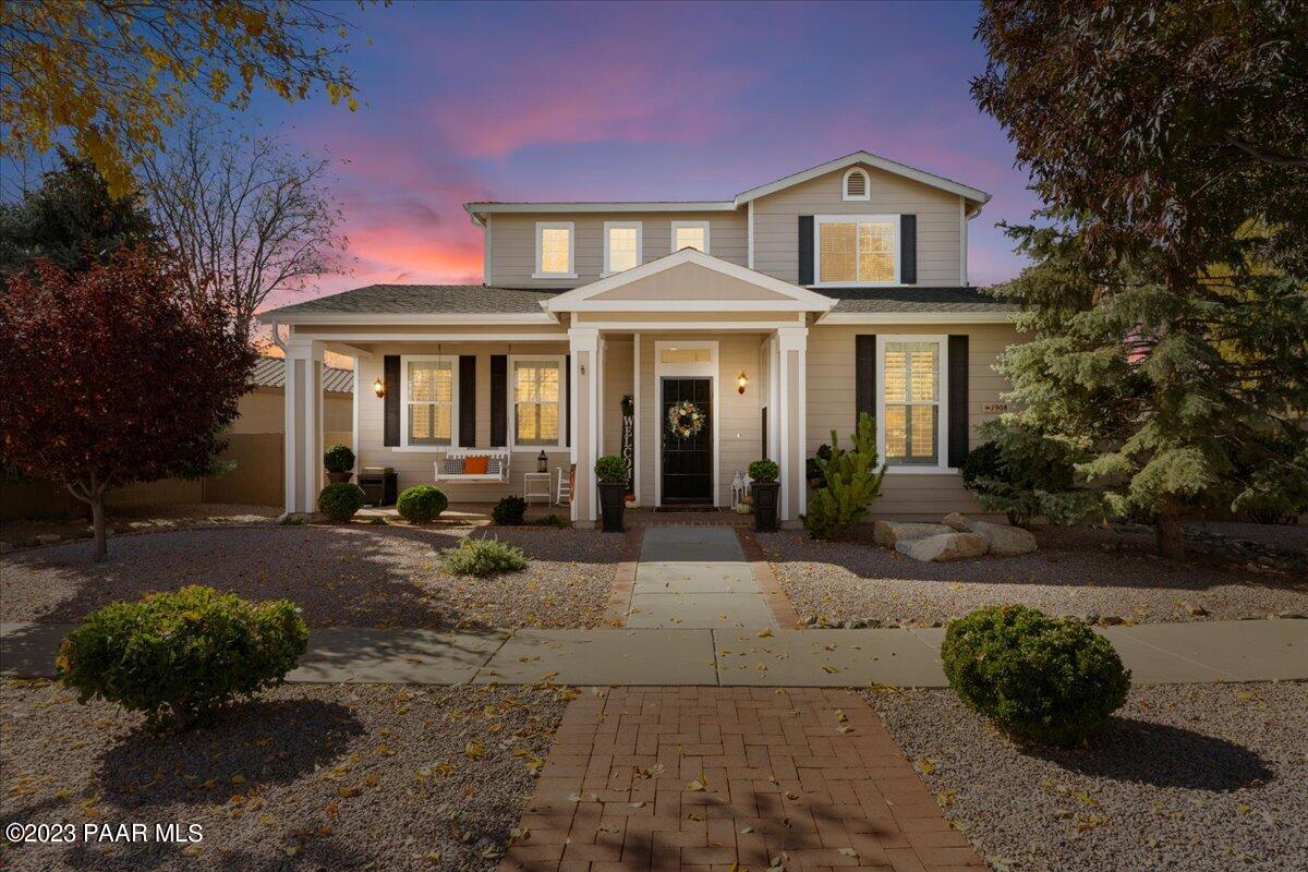 1908 North Fire Butte Way Prescott Valley, AZ 86314 - Photo 1 of 52 a front view of a house with garden