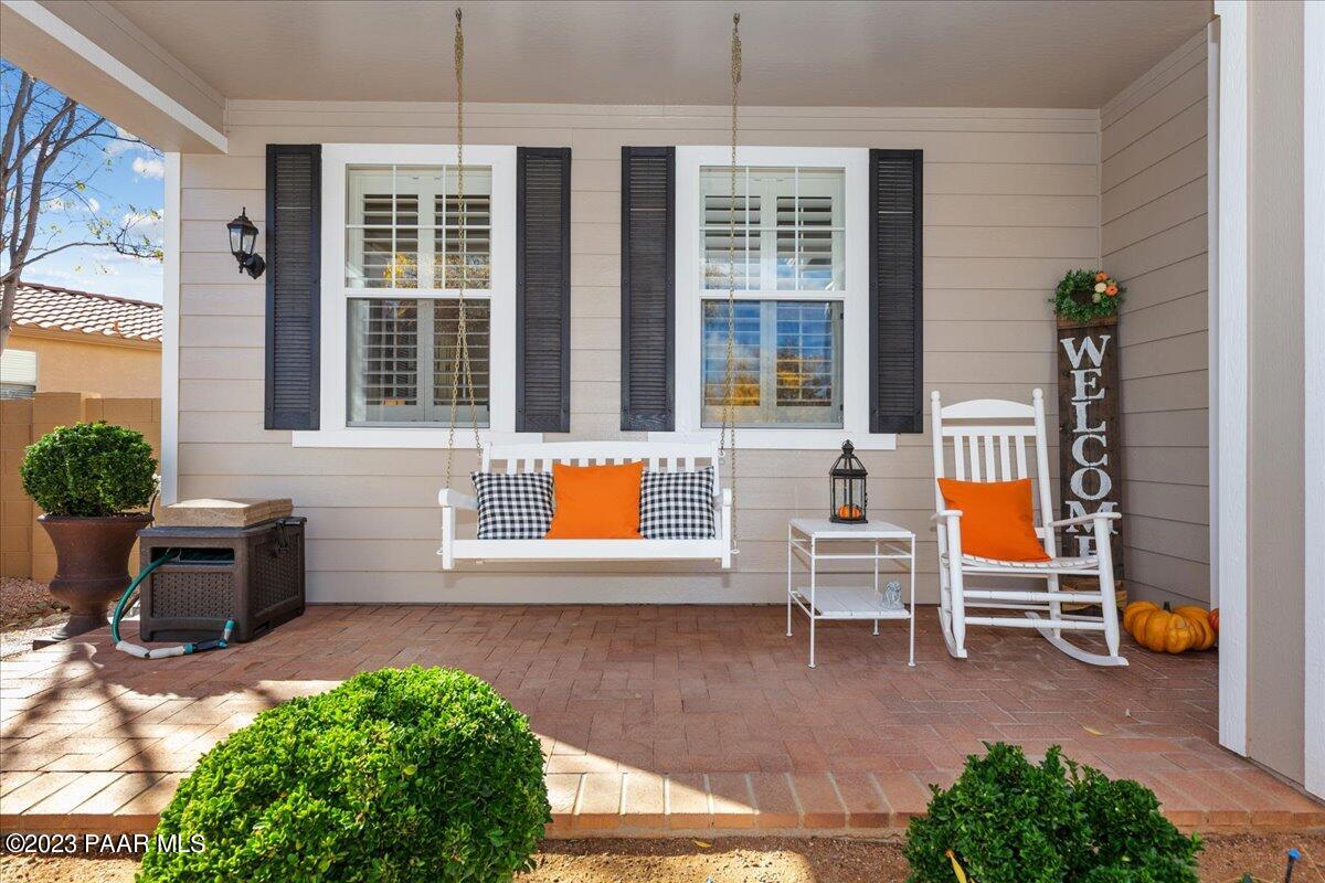 1908 North Fire Butte Way Prescott Valley, AZ 86314 - Photo 5 of 52 a front view of a house with outdoor seating