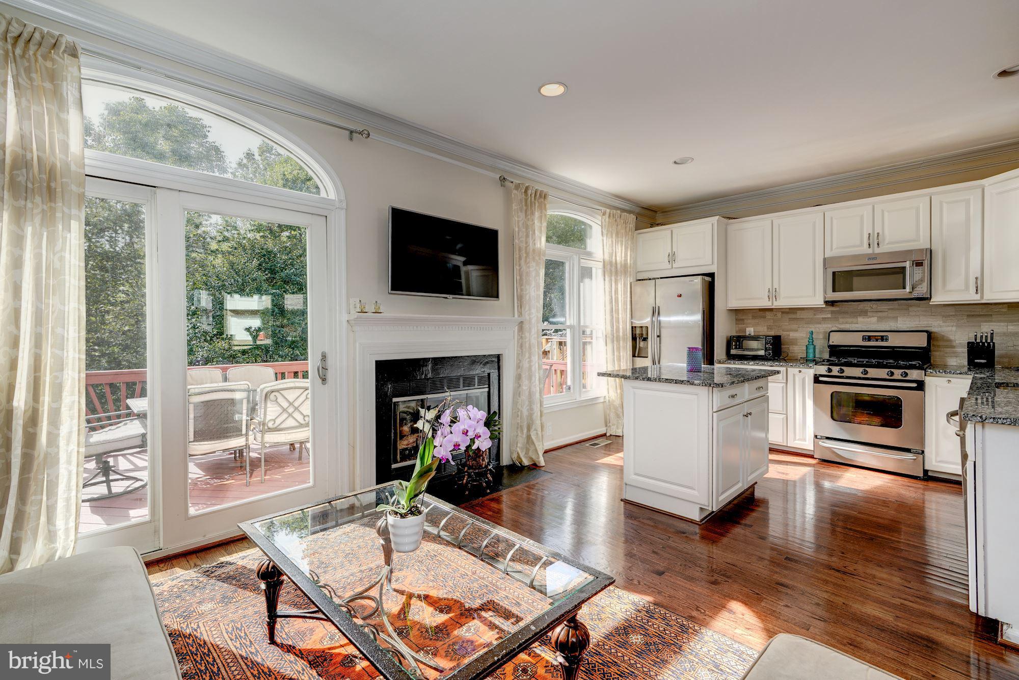 8708 Wadebrook Terrace Springfield, VA 22153 - Photo 10 of 30 Family Room and Kitchen