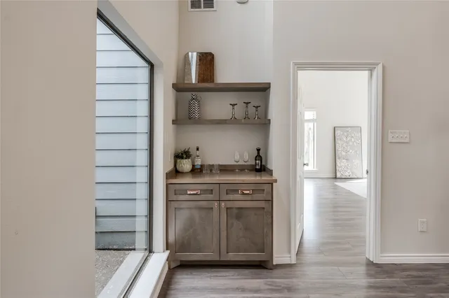 a kitchen with stainless steel appliances granite countertop a stove and a refrigerator
