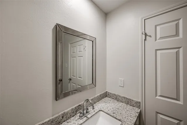 a view of hallway with mirror