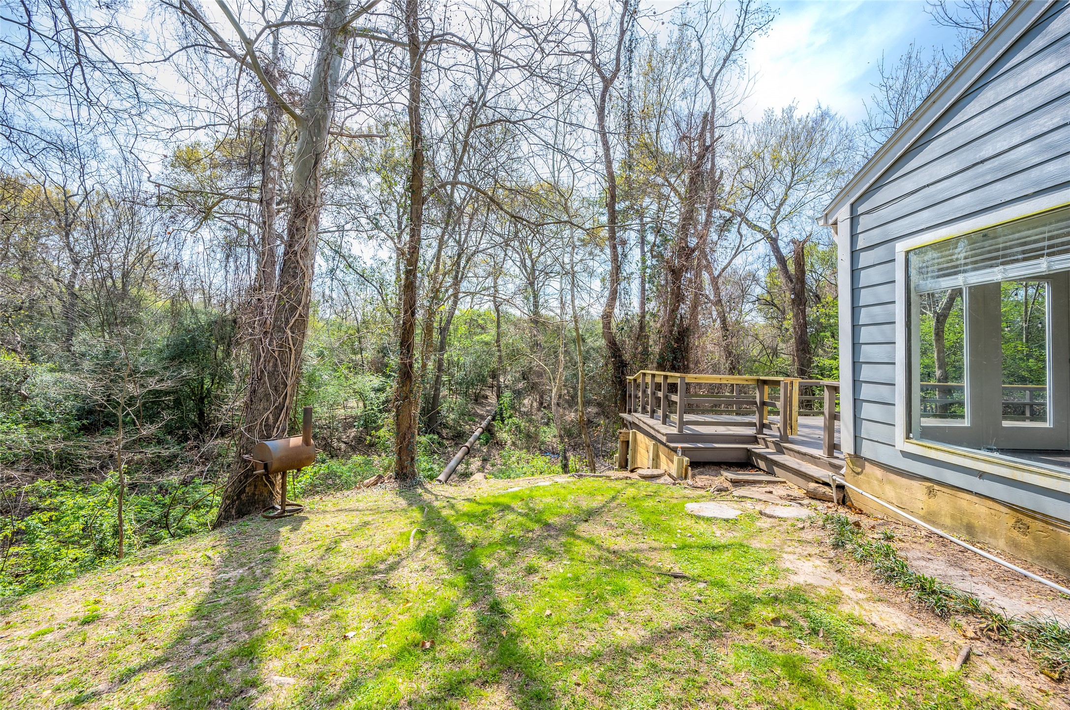 387 Rancho Bauer Drive Houston, TX 77079 - Photo 31 of 32 a view of a bench in the garden