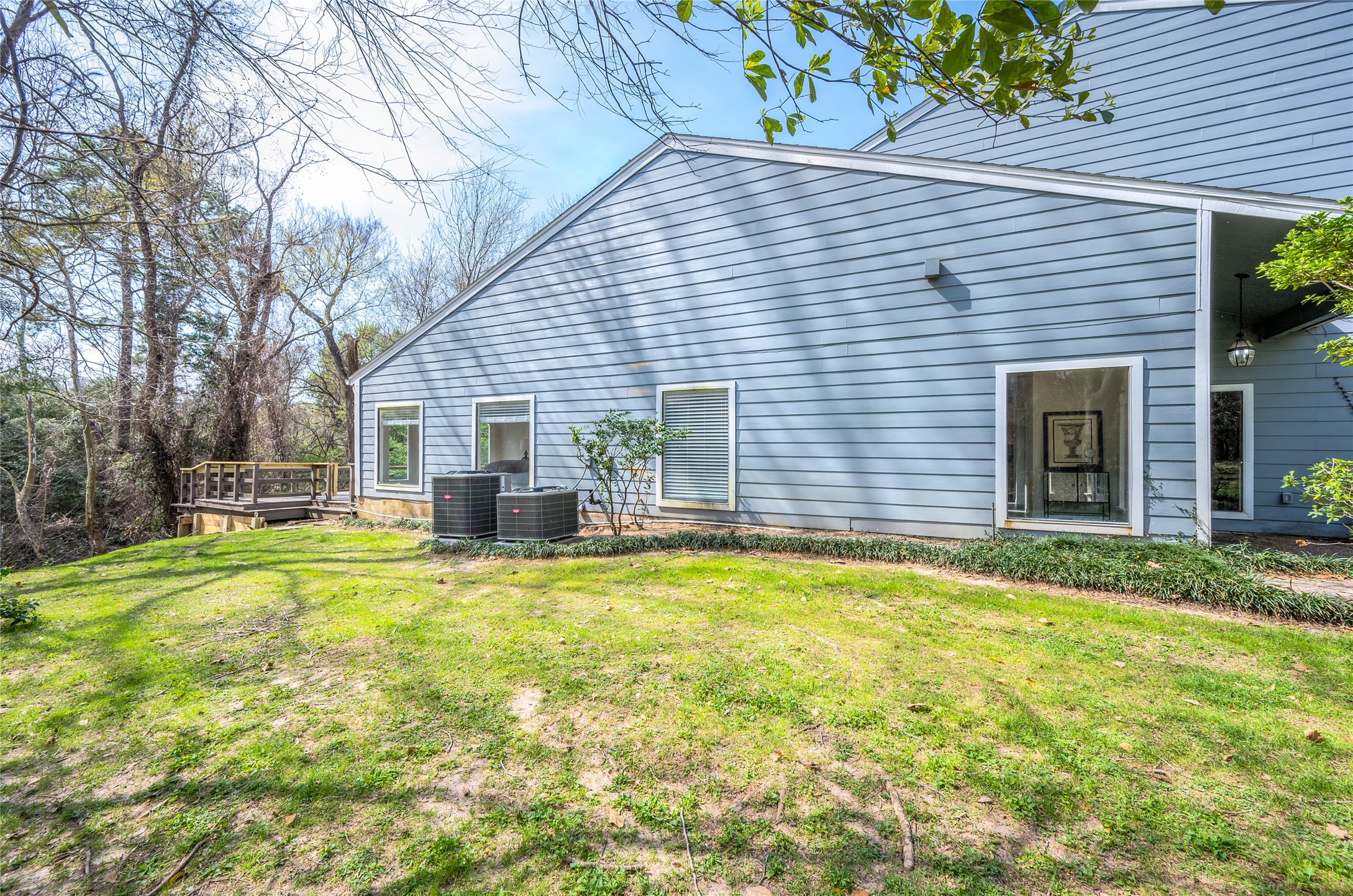 387 Rancho Bauer Drive Houston, TX 77079 - Photo 32 of 32 a view of a house with a yard and sitting area