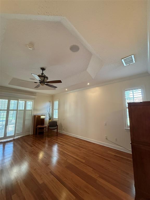 1849 Watermere Lane Windermere, FL 34786 - Photo 12 of 31 an empty room with wooden floor and windows