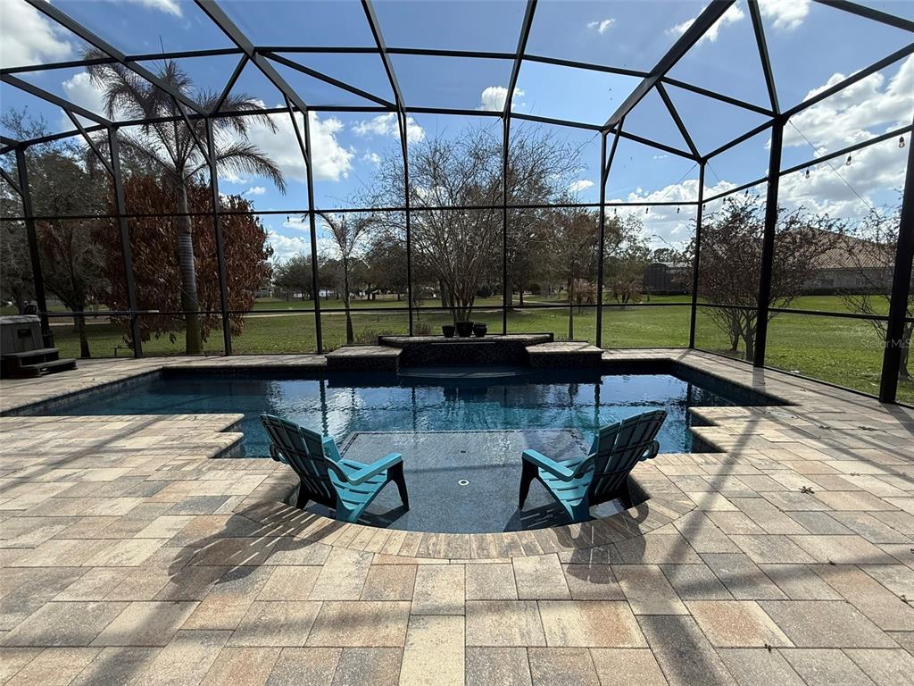 1849 Watermere Lane Windermere, FL 34786 - Photo 21 of 31 a view of a swimming pool with a patio
