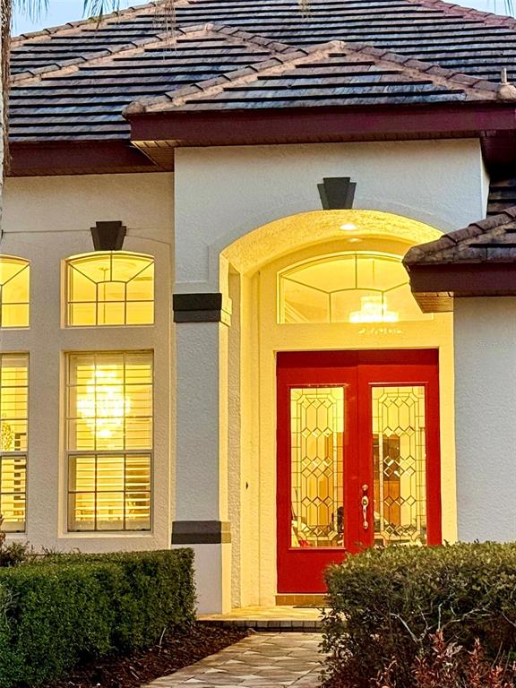 1849 Watermere Lane Windermere, FL 34786 - Photo 26 of 31 a front view of a house with a garden