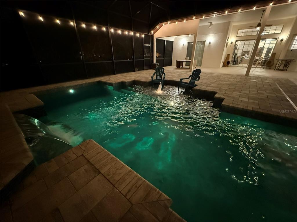 1849 Watermere Lane Windermere, FL 34786 - Photo 28 of 31 a swimming pool view with a sitting space