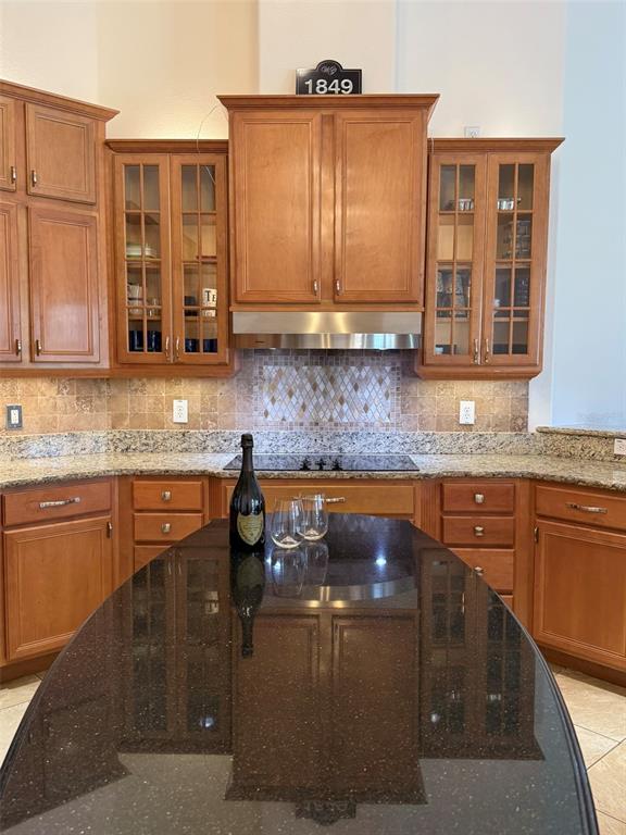 1849 Watermere Lane Windermere, FL 34786 - Photo 7 of 31 a kitchen with stainless steel appliances granite countertop wooden cabinets and a granite counter tops