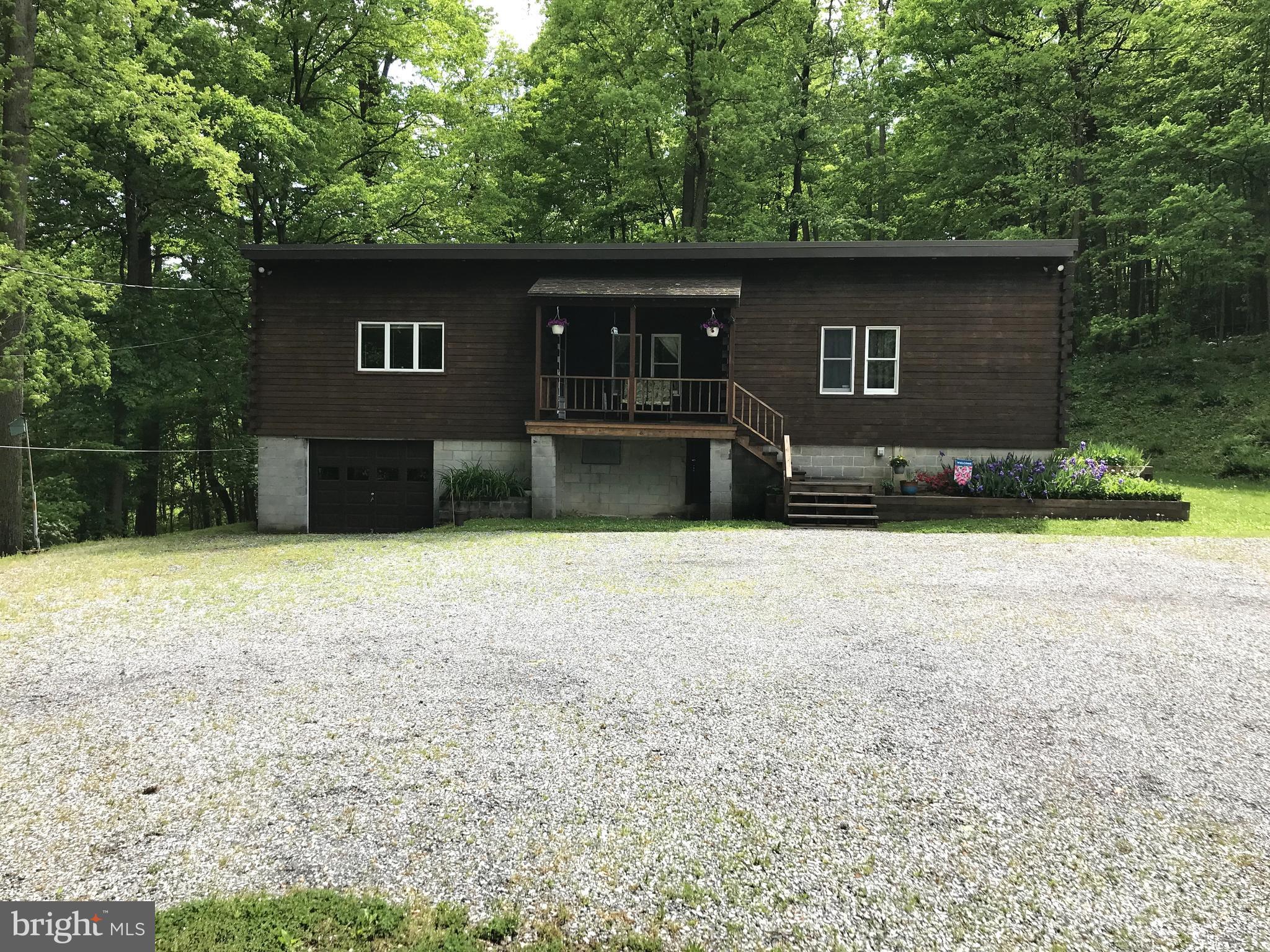204 Wheatfield Road Reading, PA 19608 - Photo 7 of 50 a front view of a house with a yard