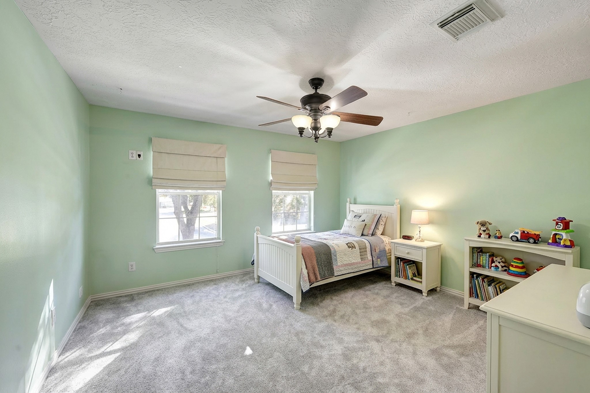 2511 Bridgestone Park Lane Spring, TX 77386 - Photo 17 of 25 This virtually furnished secondary bedroom connects to a jack-and-jill bathroom and walk-in closet.