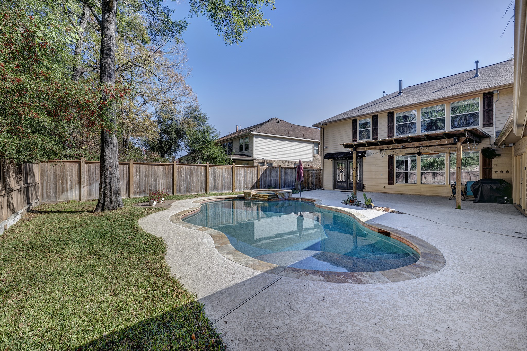 2511 Bridgestone Park Lane Spring, TX 77386 - Photo 21 of 25 The lagoon style pool is perfect for those lazy days of summer!