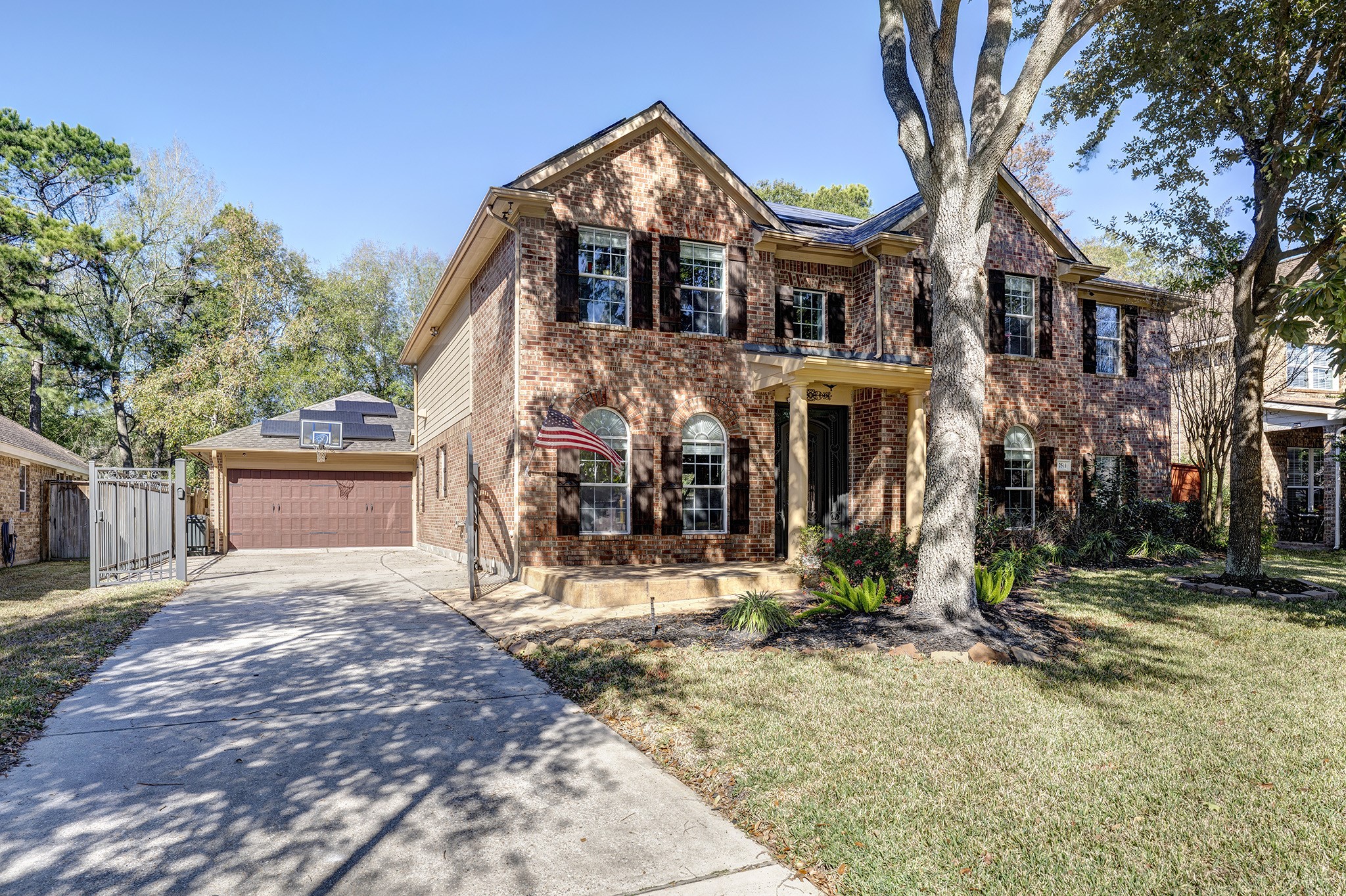 2511 Bridgestone Park Lane Spring, TX 77386 - Photo 23 of 25 Additional view shows the gated drive leading to the garage.