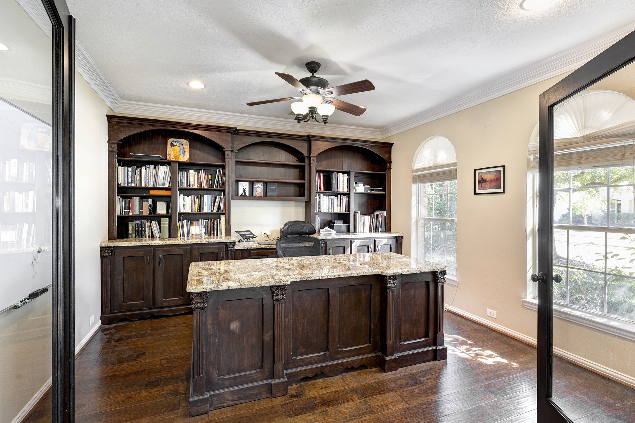 2511 Bridgestone Park Lane Spring, TX 77386 - Photo 4 of 25 The home office features custom built-ins and desk topped in granite.