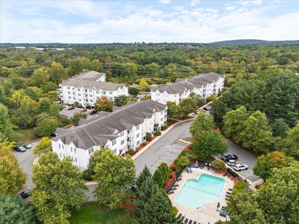 21 Hampshire Road, Unit 313 Methuen, MA 01844 - Photo 30 of 35 an aerial view of residential houses with outdoor space and trees