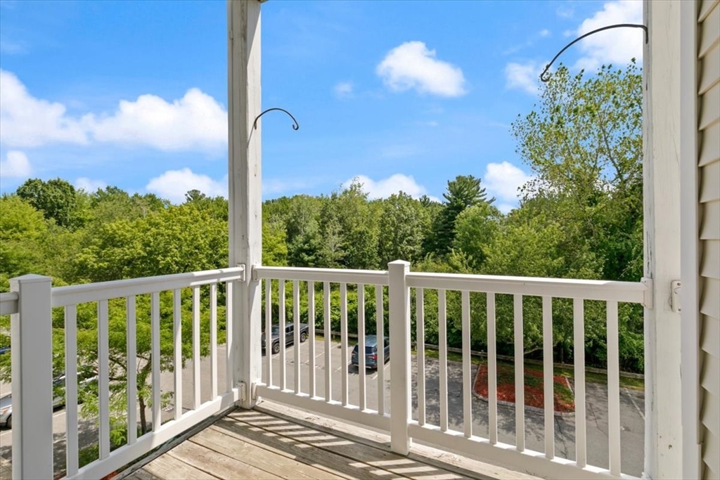 21 Hampshire Road, Unit 313 Methuen, MA 01844 - Photo 5 of 35 a balcony with view of yard
