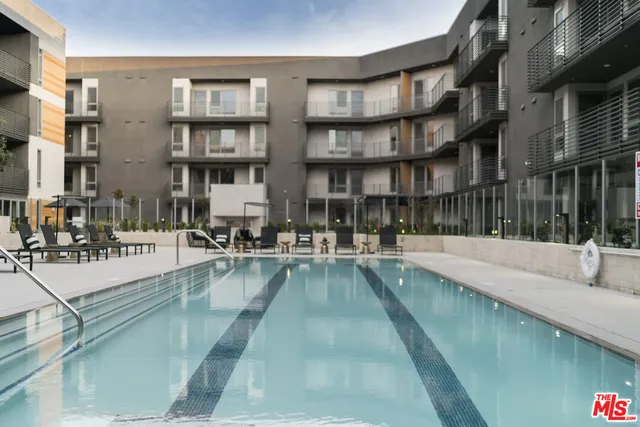 a building exterior with outdoor seating