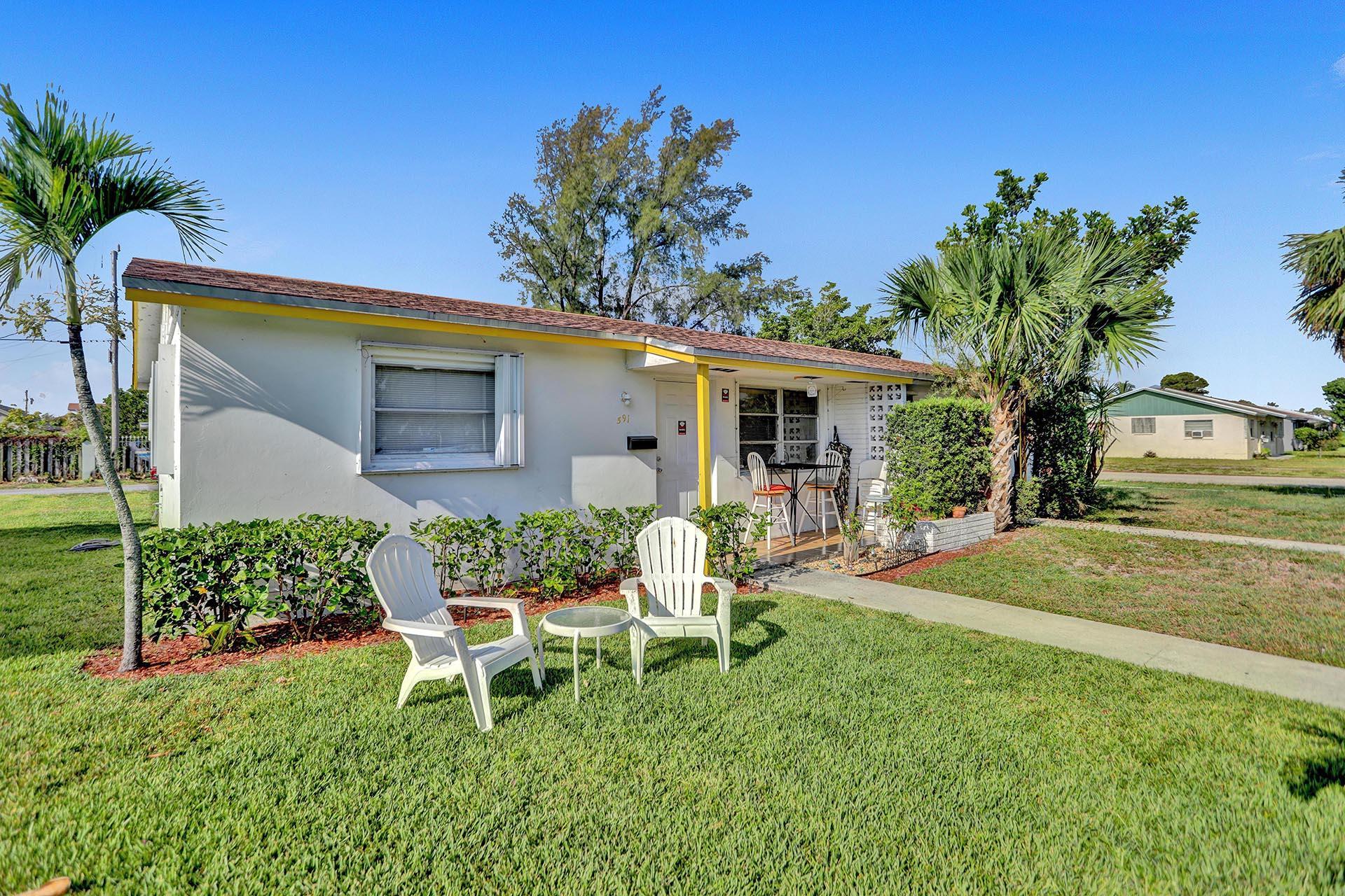 591 Silver Beach Road Riviera Beach, FL 33403 - Photo 1 of 29 G87A4072