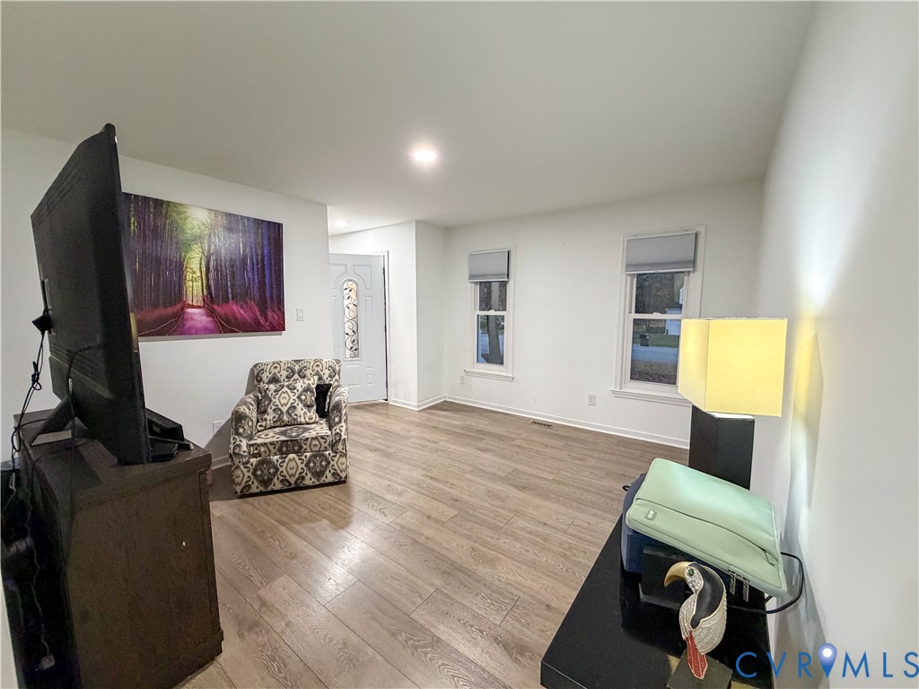 13727 Nashua Terrace Midlothian, VA 23112 - Photo 11 of 33 a bedroom with furniture and a flat screen tv