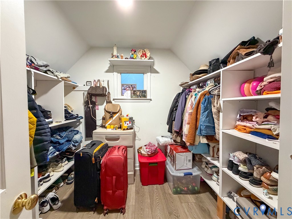 13727 Nashua Terrace Midlothian, VA 23112 - Photo 17 of 33 a view of walk in closet with clothes and shoes