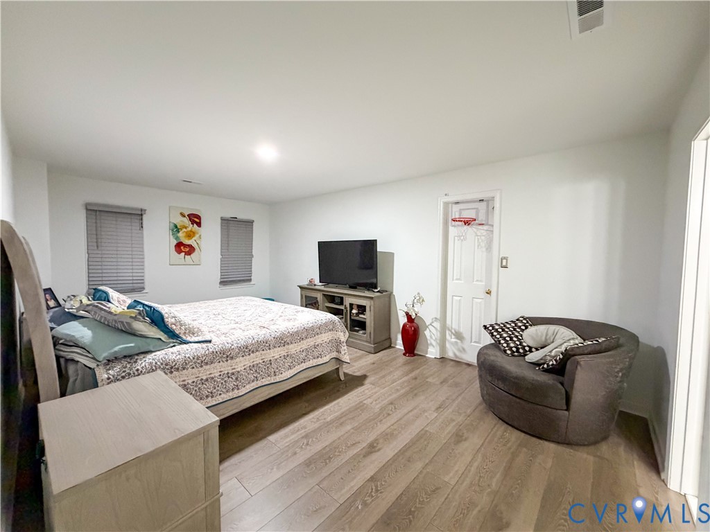 13727 Nashua Terrace Midlothian, VA 23112 - Photo 19 of 33 a living room with furniture and a flat screen tv