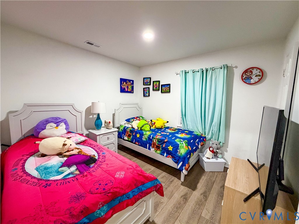 13727 Nashua Terrace Midlothian, VA 23112 - Photo 23 of 33 a bedroom with bed and a dresser