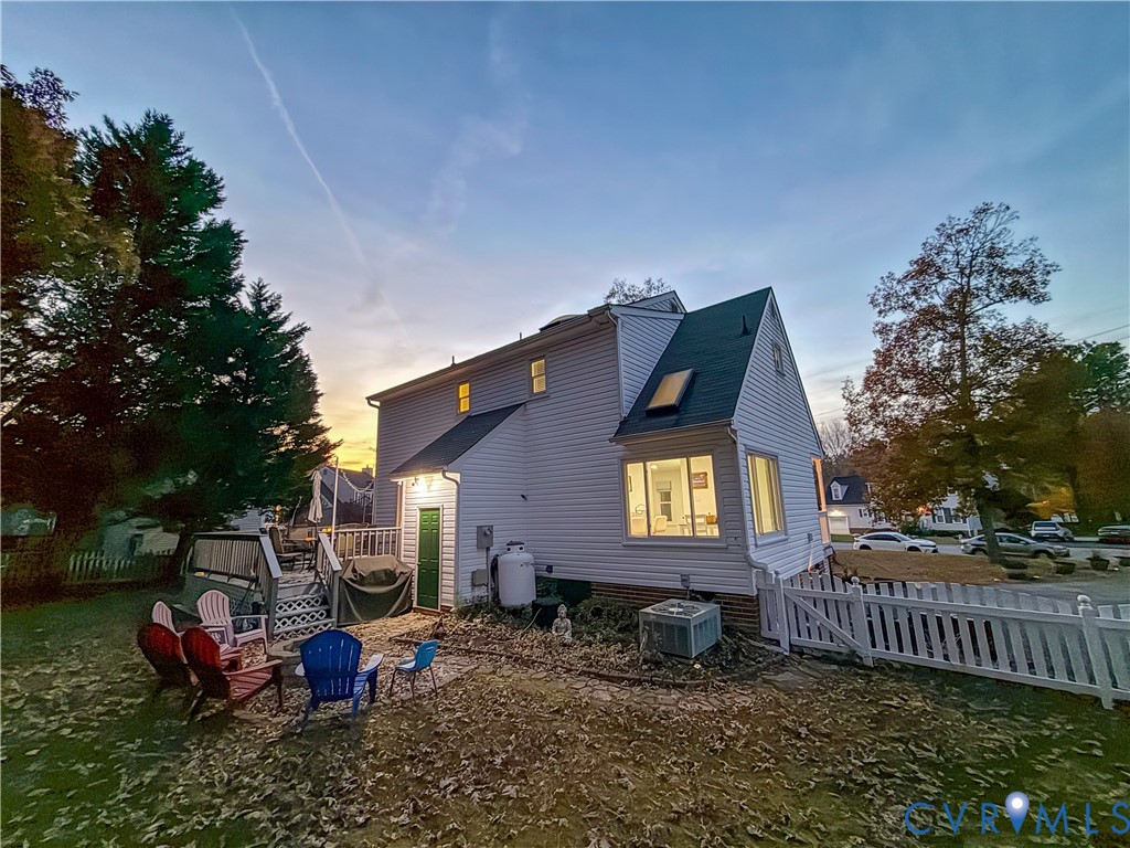 13727 Nashua Terrace Midlothian, VA 23112 - Photo 32 of 33 a front view of a house with a garden and porch