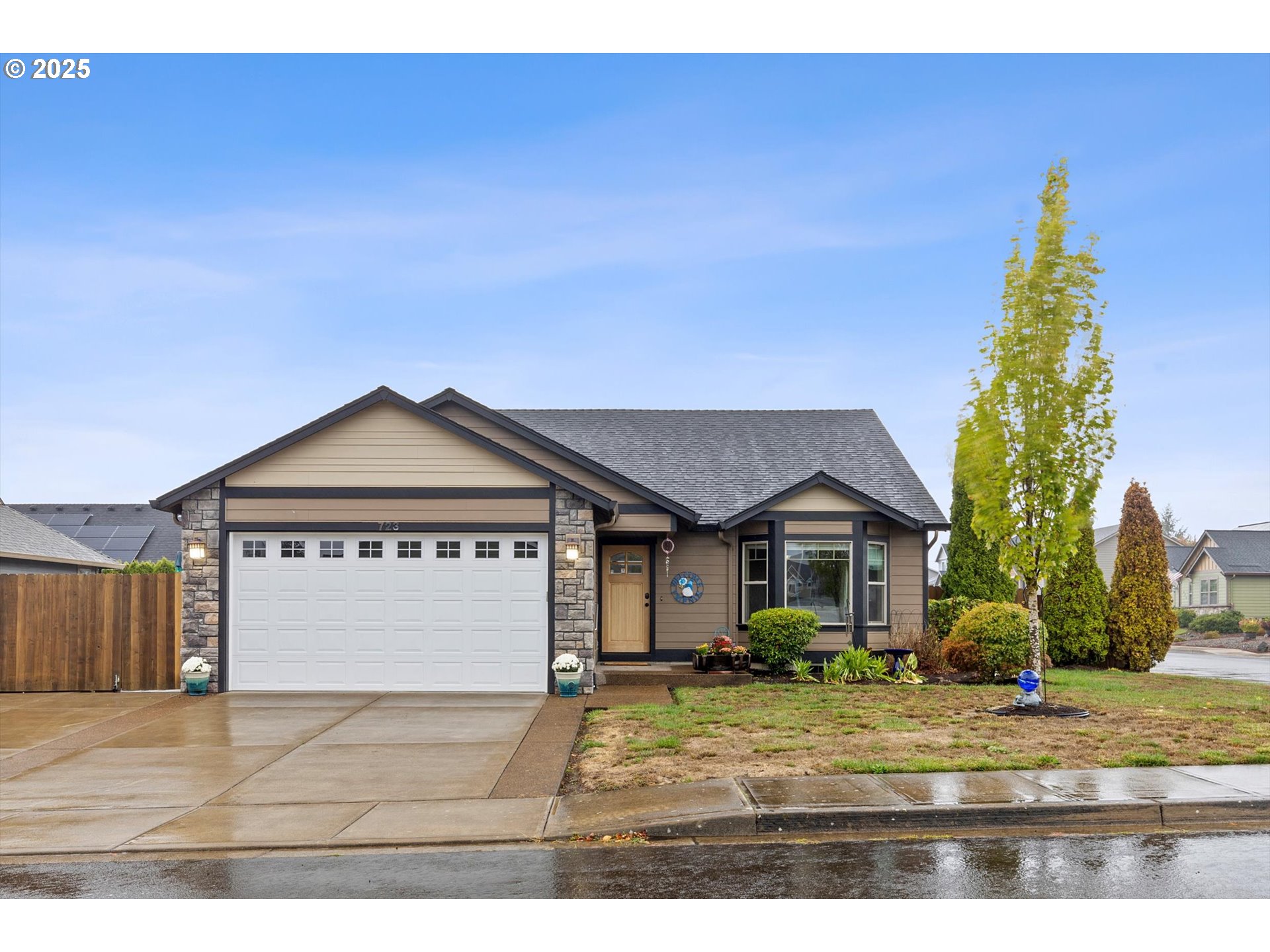 a front view of a house with a yard
