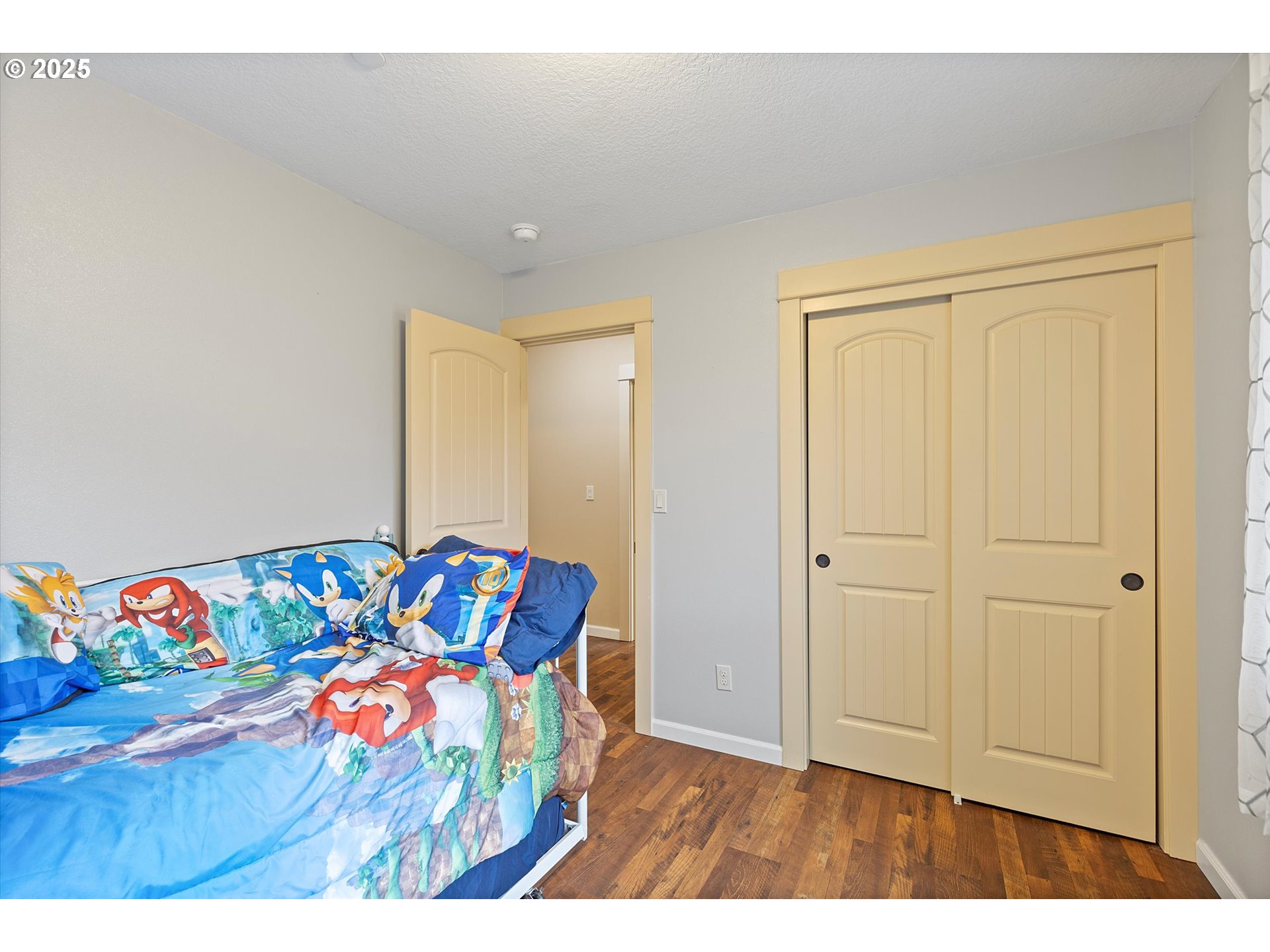 723 North 7th Street Carlton, OR 97111 - Photo 15 of 32 a utility room with painting on the wall and a baby crib