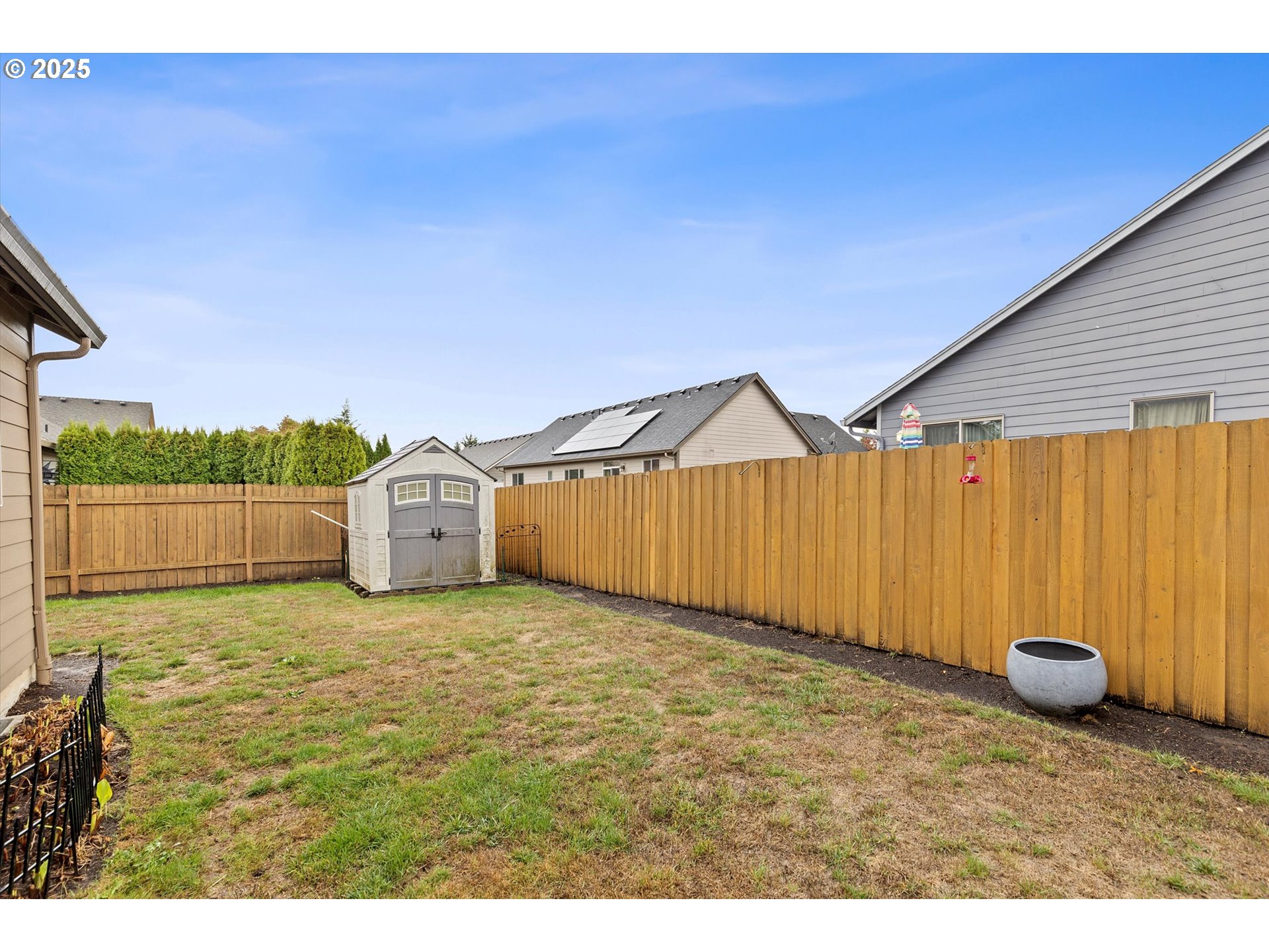 723 North 7th Street Carlton, OR 97111 - Photo 25 of 32 a view of a backyard of a house