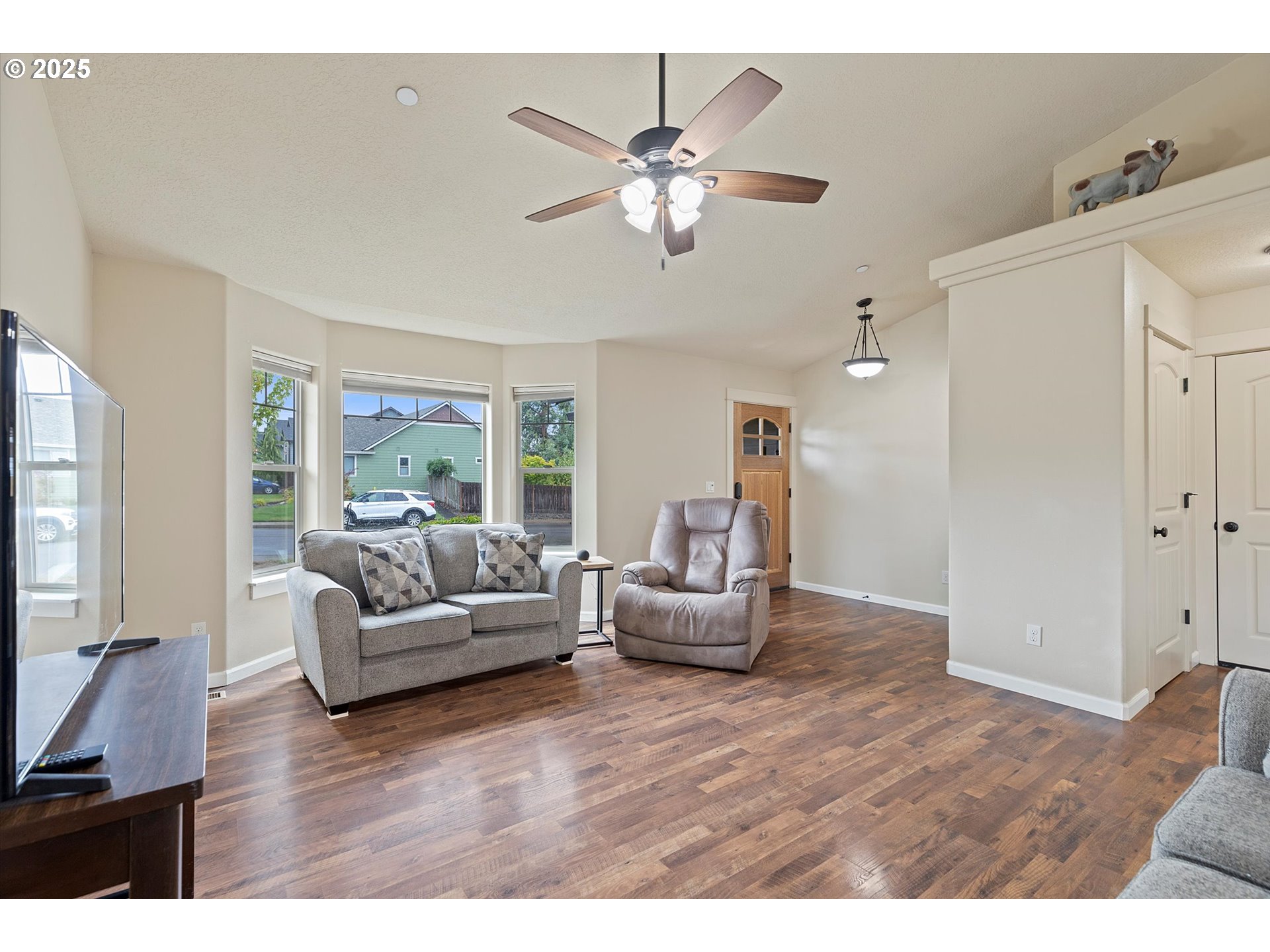 723 North 7th Street Carlton, OR 97111 - Photo 4 of 32 a living room with furniture and a large window