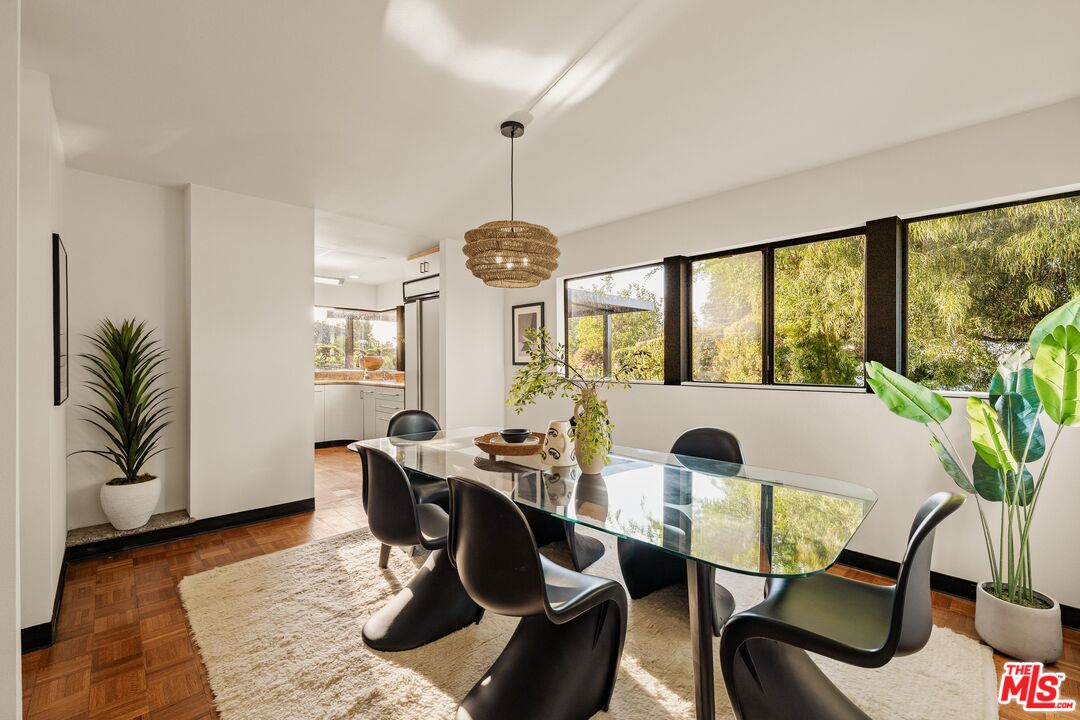 4303 San Rafael Avenue Los Angeles, CA 90042 - Photo 12 of 74 a view of a dining room with furniture window and wooden floor