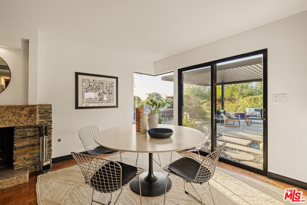 4303 San Rafael Avenue Los Angeles, CA 90042 - Photo 25 of 74 a dining room with furniture and wooden floor
