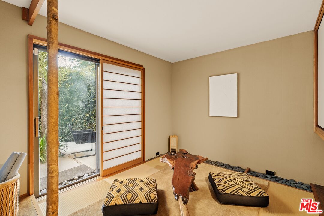 4303 San Rafael Avenue Los Angeles, CA 90042 - Photo 36 of 74 a bedroom with a bed and a window