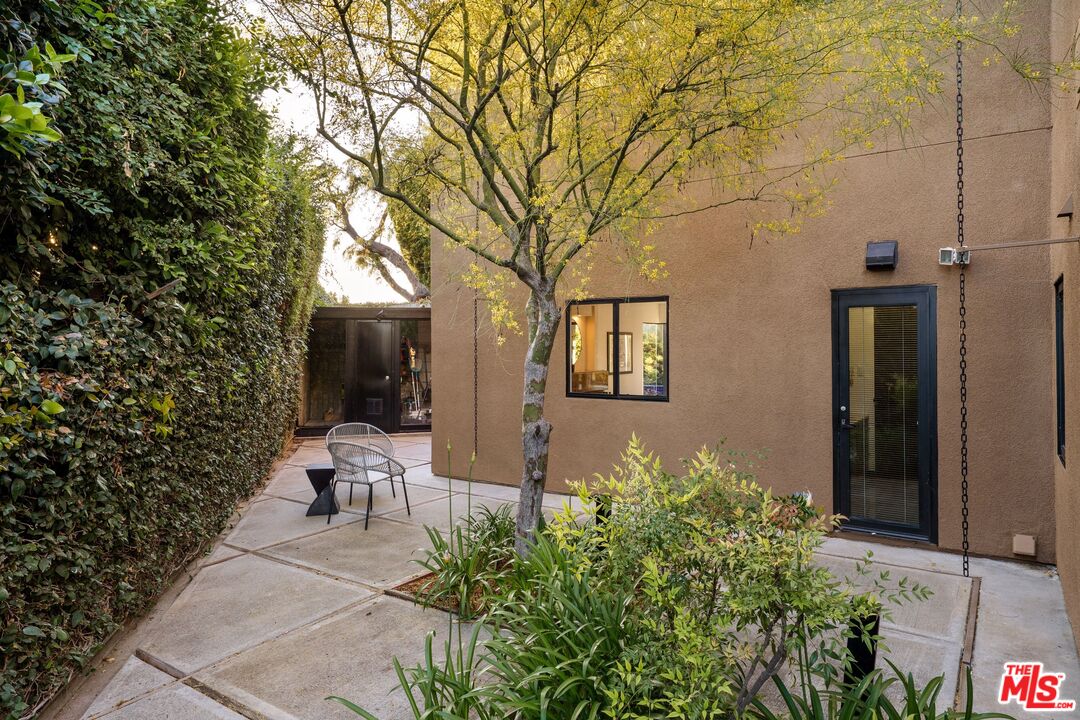 4303 San Rafael Avenue Los Angeles, CA 90042 - Photo 37 of 74 a view of a house with backyard sitting area and garden