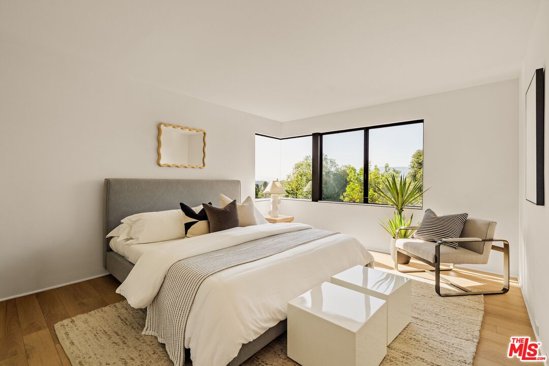 4303 San Rafael Avenue Los Angeles, CA 90042 - Photo 42 of 74 a bedroom with a bed and a window