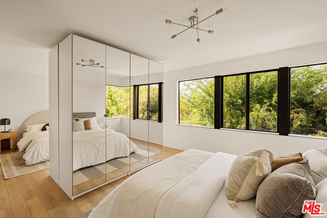 4303 San Rafael Avenue Los Angeles, CA 90042 - Photo 50 of 74 a bed room with a bed and a large window