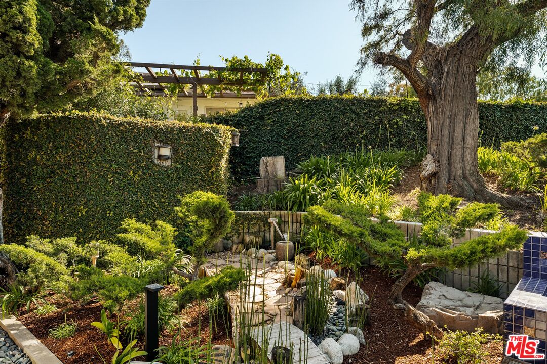 4303 San Rafael Avenue Los Angeles, CA 90042 - Photo 56 of 74 a view of a garden with plants