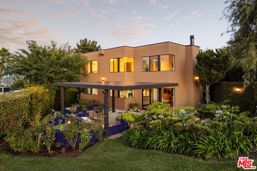 4303 San Rafael Avenue Los Angeles, CA 90042 - Photo 61 of 74 a front view of a house with a yard