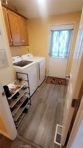 a room with furniture and a window