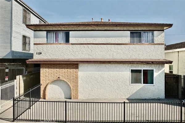 a front view of a house with a door