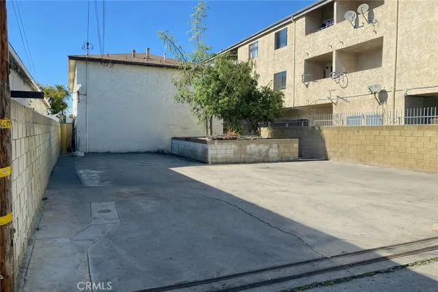 a view of front door and small yard