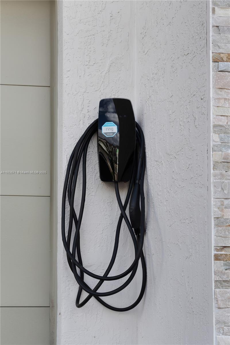 23471 Southwest 129th Path Homestead, FL 33032 - Photo 11 of 52 a view of staircase with utility and wooden floor