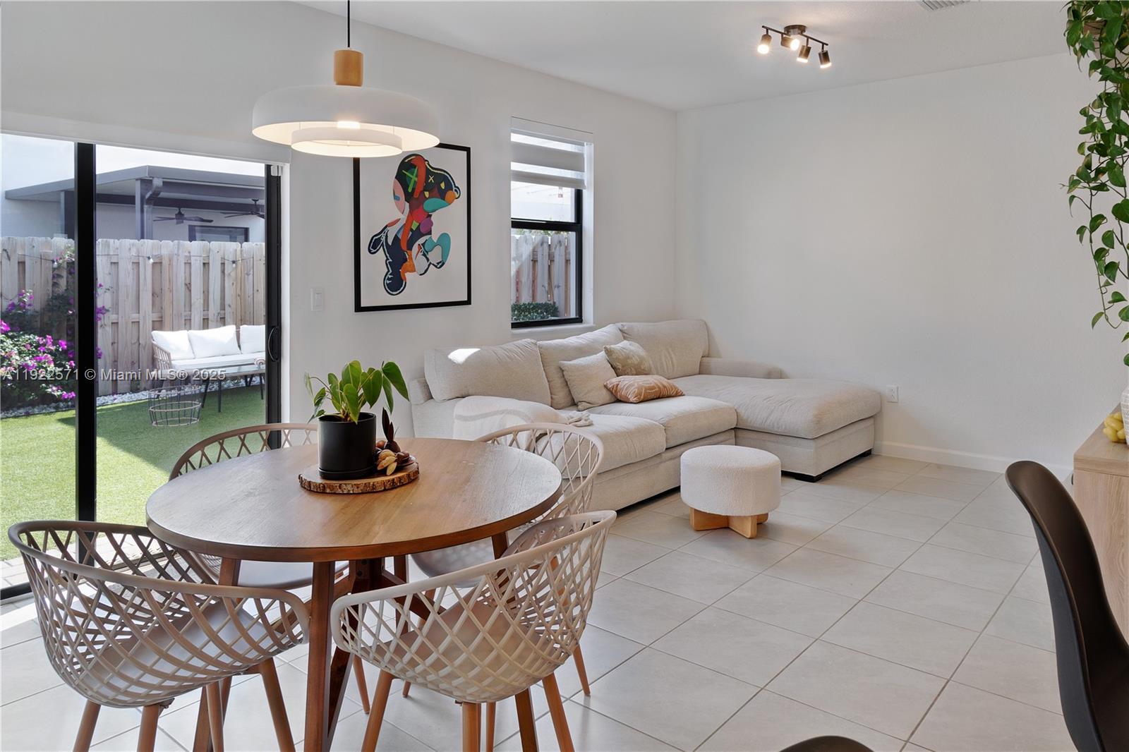 23471 Southwest 129th Path Homestead, FL 33032 - Photo 20 of 52 a living room with furniture and a rug