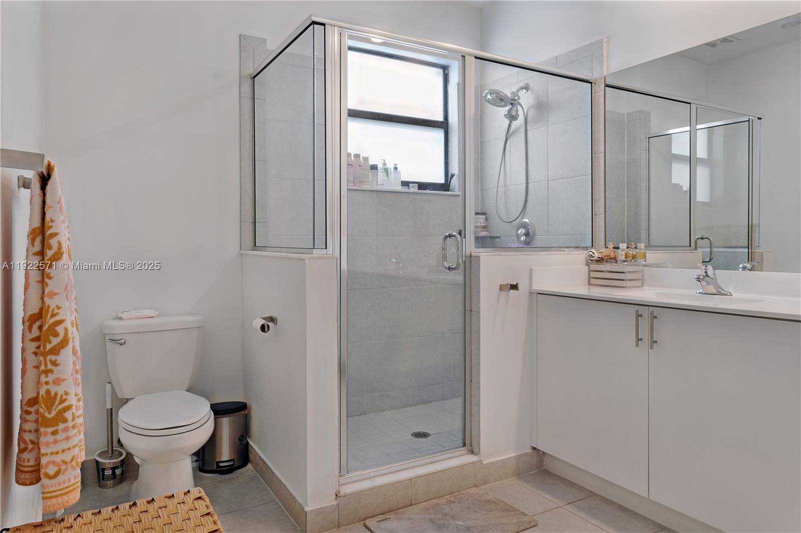 23471 Southwest 129th Path Homestead, FL 33032 - Photo 37 of 52 a bathroom with a granite countertop sink toilet and shower